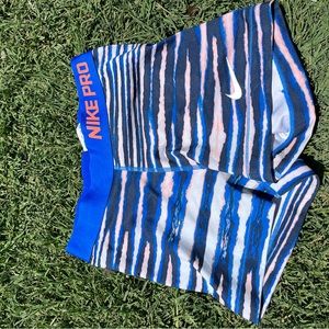 adult small nike pros. never worn. good condition